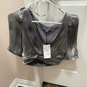 Selling a size small top from Zara; never been worn with tag!